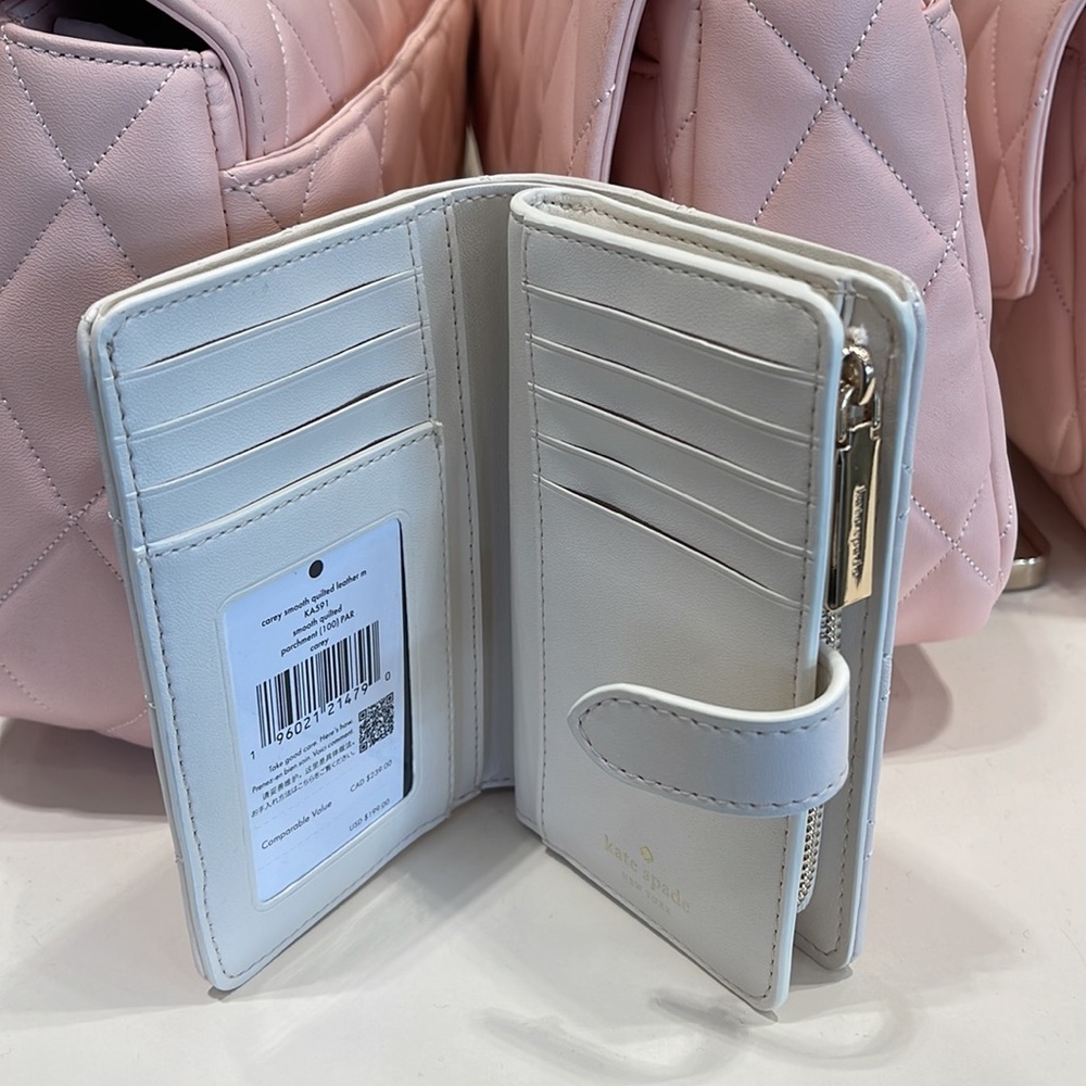 Kate Spade Carey Medium Compartment Bifold Wallet
COLOR: Parchment - Picture 8 of 16
